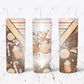 tumbler design featuring a boho, neutral color theme Christmas scene. Candy canes, reindeer, ornaments, marshmallows, hot chocolate, santa hats and snowflakes are scattered throughout the design. A bleach effect is on the front of the design with the words Merry Merry Christmas.